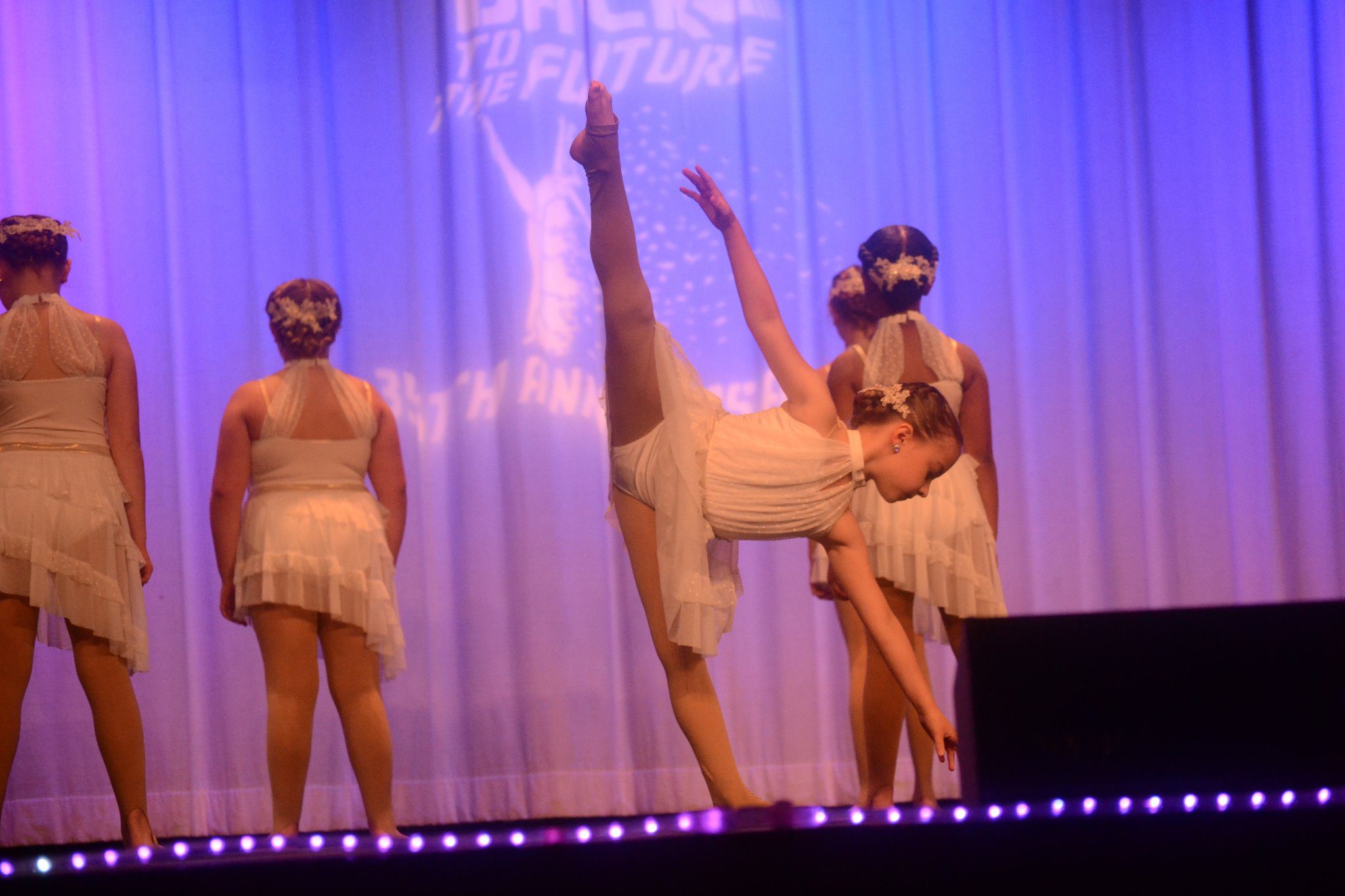 Tilley’s Dance Academy dancers performing a routine on stage