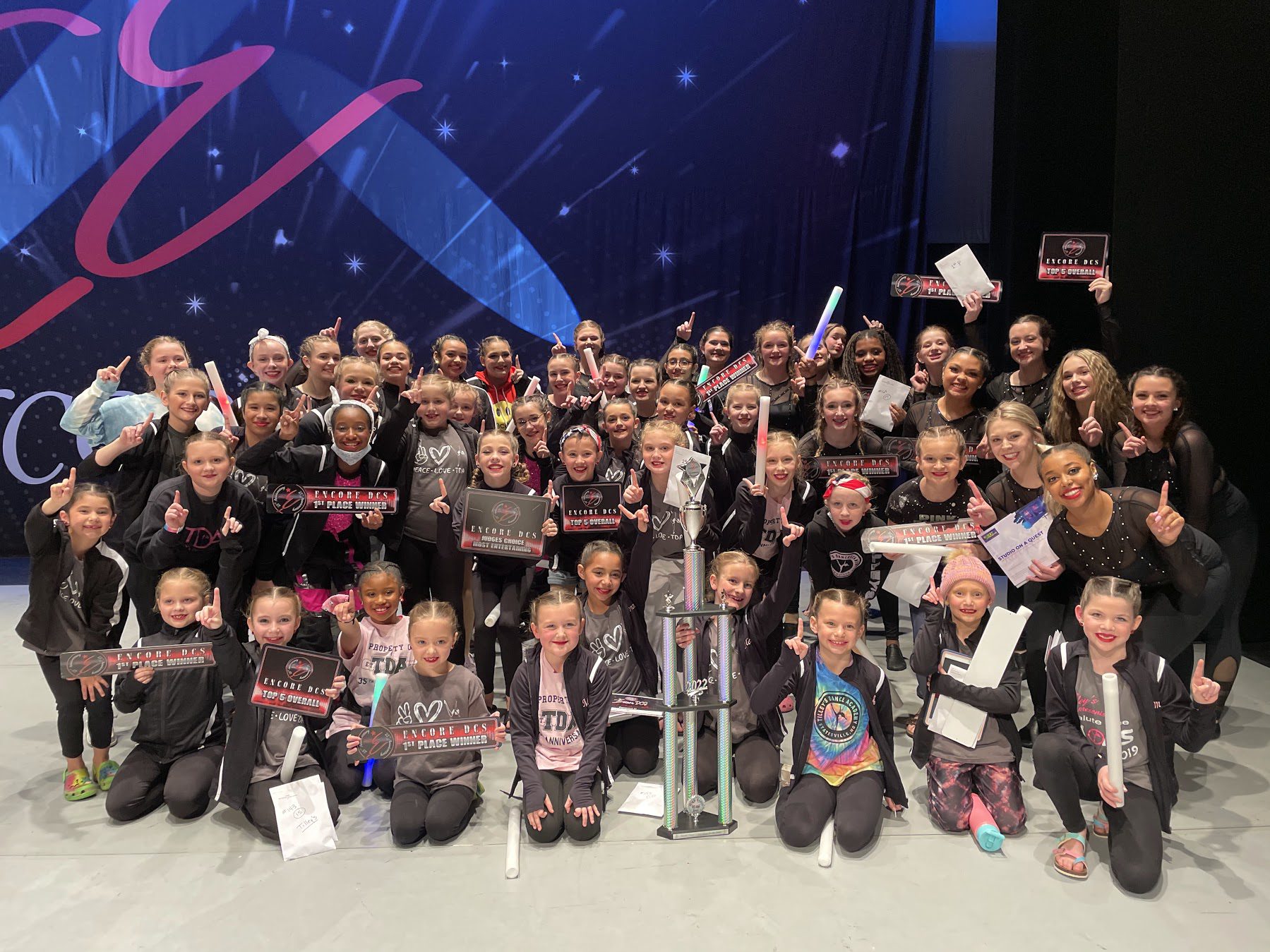 Tilley's Dance Academy's competitive dance team with trophies 